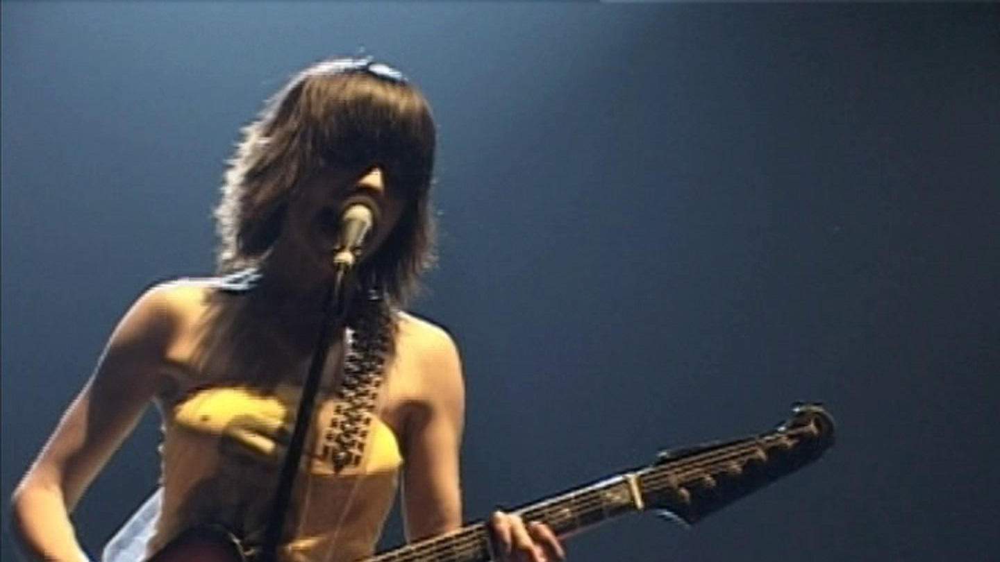 Backdrop for PJ Harvey on Tour: Please Leave Quietly