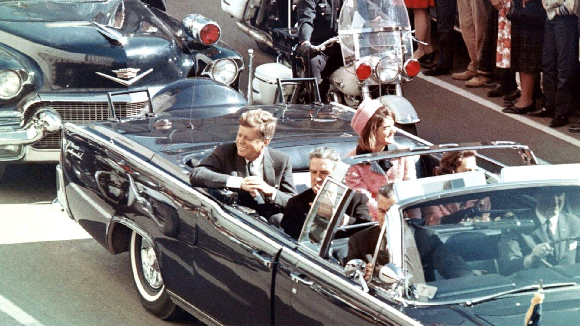 Backdrop for JFK Revisited: Through the Looking Glass